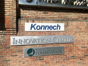 A picturing showing signs for Konnech, MSU Innovation Center and MSU Foundation for visual interest.